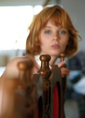 Рыжая красотка с красивыми титьками